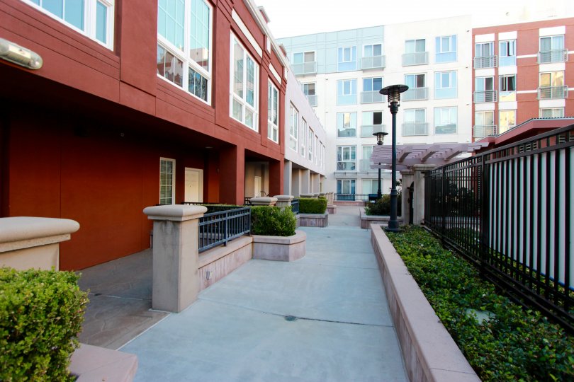 sunny day apartments nice neighborhood, lighted and fenced. many windows.