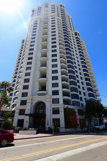 A tall, multi-story white building in Park Place neighborhood