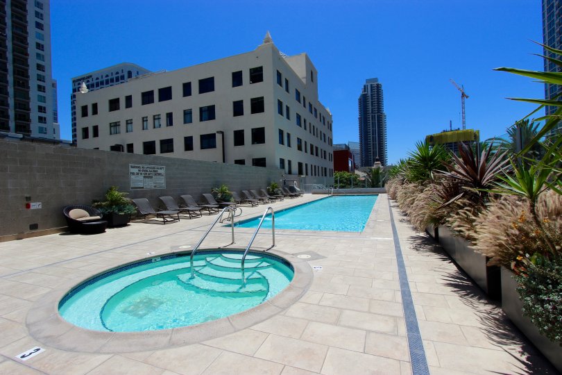 view of sapphire tower with a clear sky and swimming pool in san diego