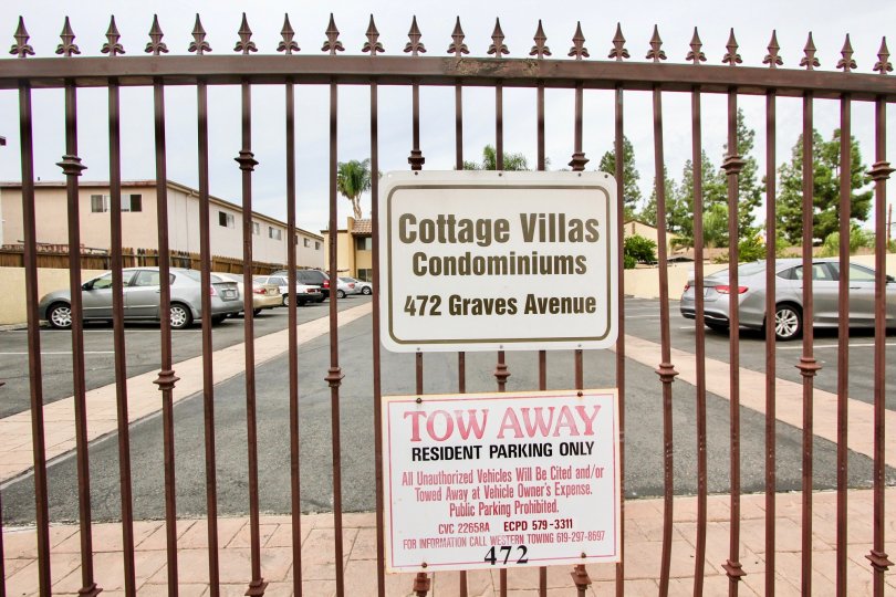 An iron gate to the parking lot at the Cottage Villas housing community