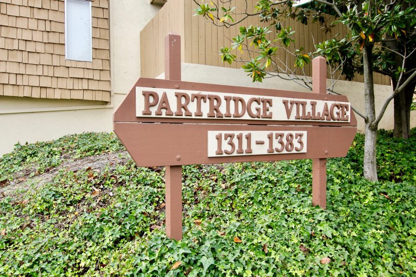 Apartment complex sign for Partridge Village in El Cajon, California