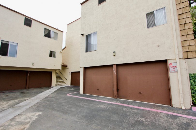 Partridge Village in El Cajon, California features 2 car garages below the units.