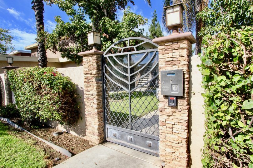 Security gate with lights at Tres Palmas in El Cajon California