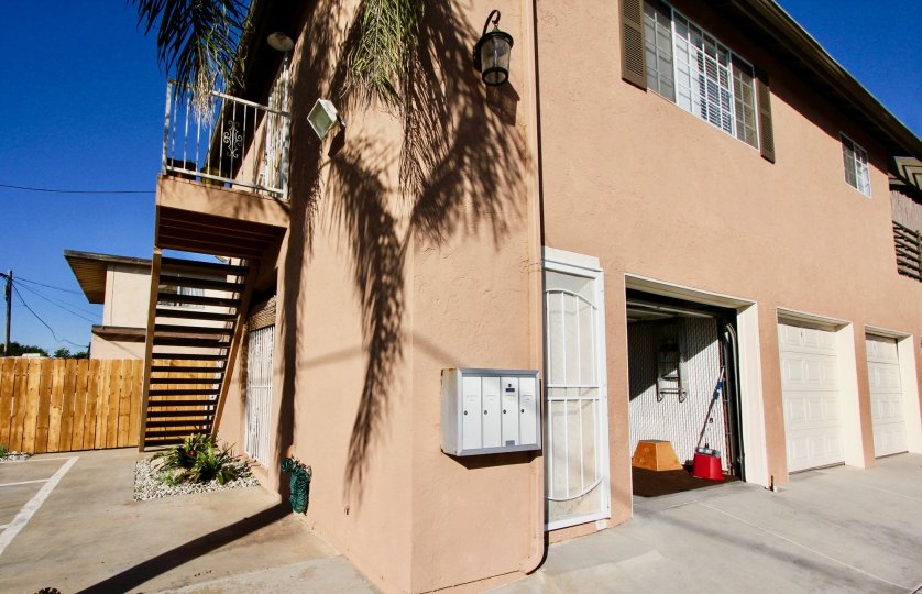 An open garage door on the Cherry breeze apartment building