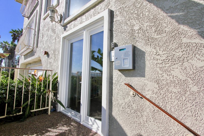 Glass door entrance at Seacoast Beach Homes in Imperial Beach California