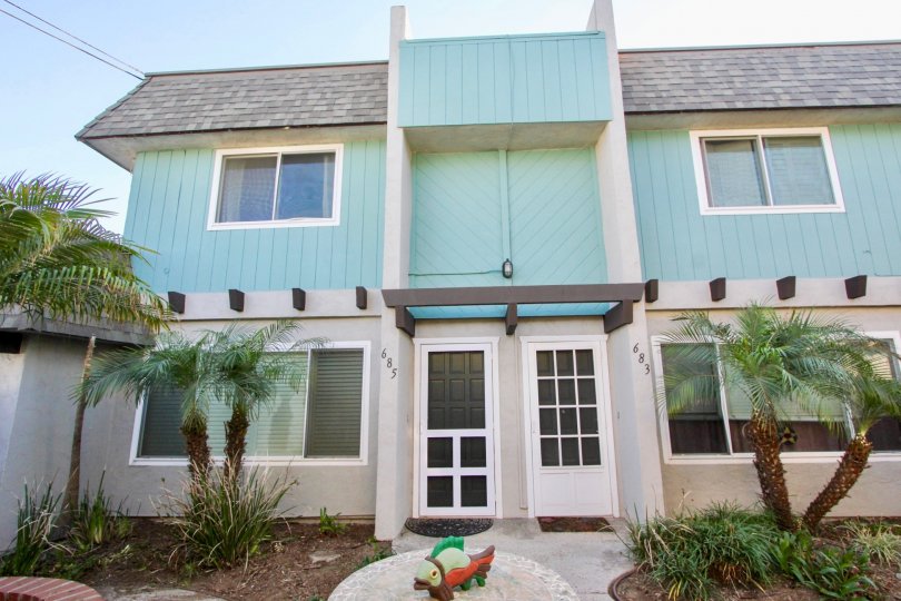 turquoise townhouse in the community of Silver Strand Gardens