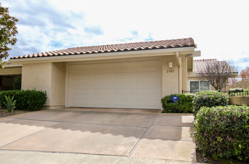 Home with driveway and a garage inside El Dorado in La Jolla CA