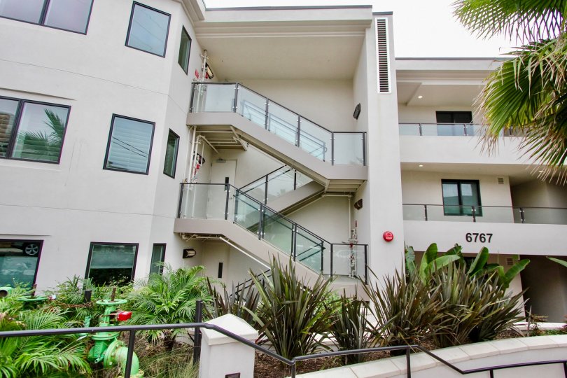 Three story residence with glass stairway inside One Neptune at La Jolla CA