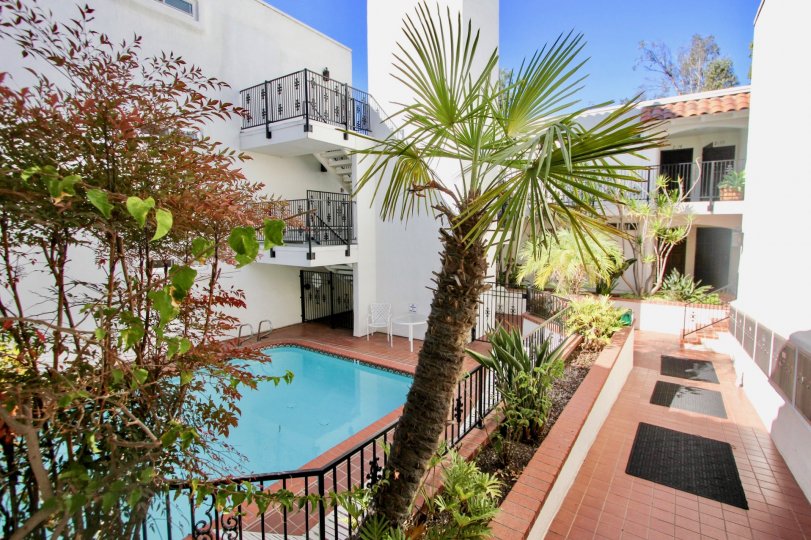Courtyard view with outdoor pool in the neighborhood of Villa Bahia, CA