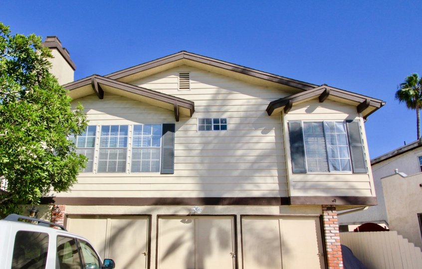 Garage and view of upstairs windows at Hemitage II in Normal Heights, Ca.