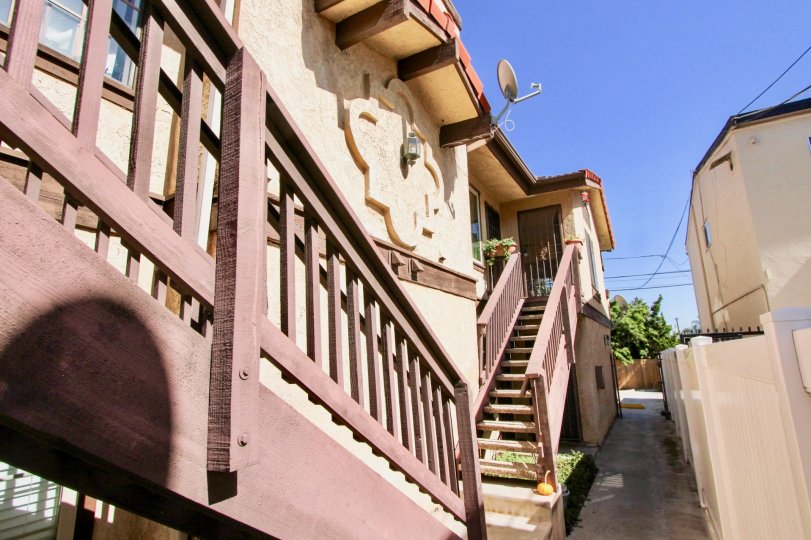 Outdoor staircases and walkway between buildings at Madison Park in Normal Heights, California