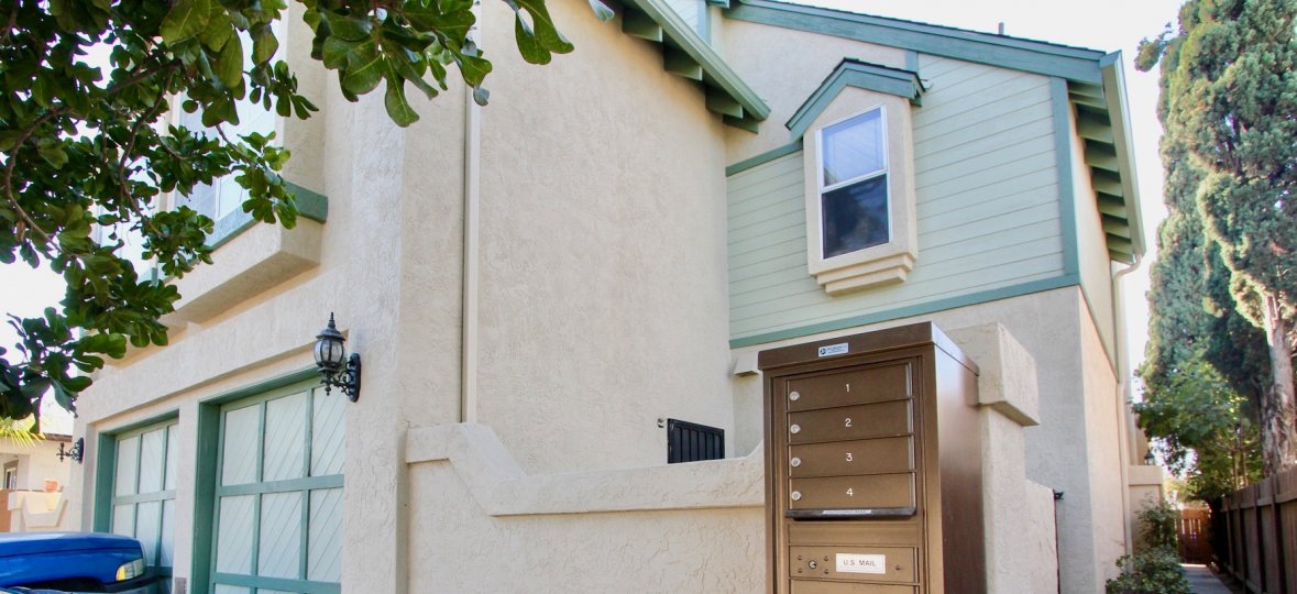 Condo/ townhome, composite exterior, stucco and siding, garage spaces, mailboxes privacy fences