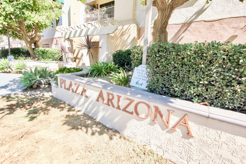 The large street sign outside of Plaza Arizona in California.