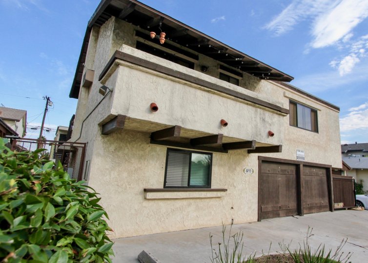 Two story residential building with attached garages at Golden Terrace in North Park California