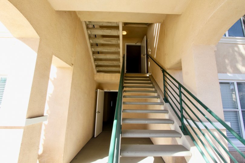 Entrance stairs before door inside building in La Costa Villas