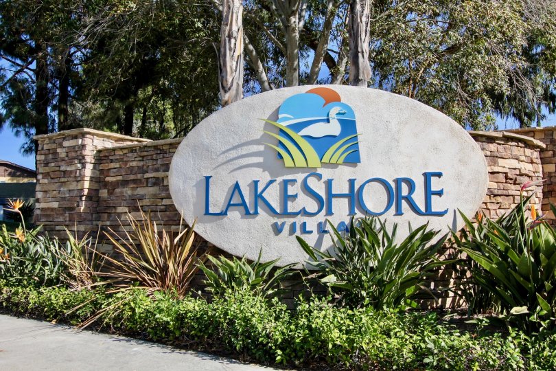 Large entrance sign for Lakeshore Villas, Oceanside, California
