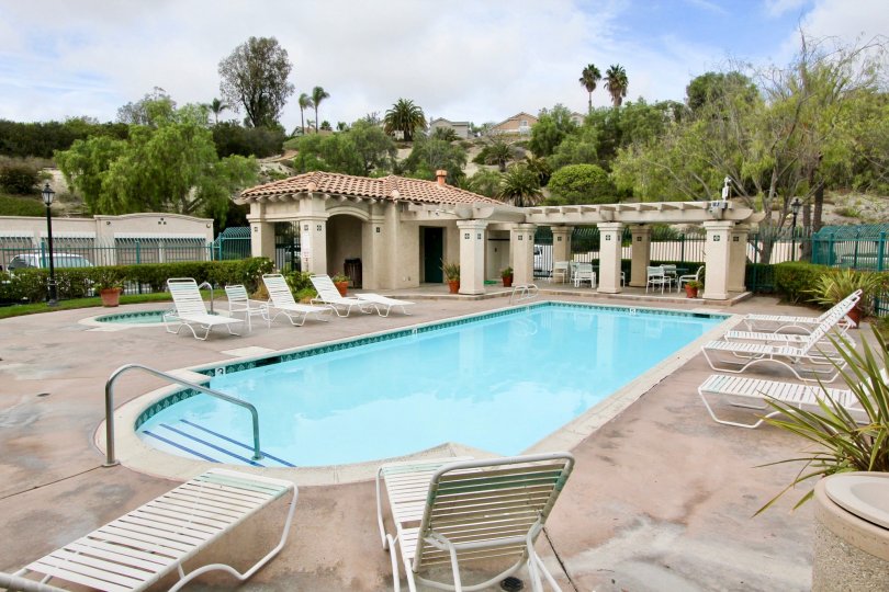 The poolside view of a complex in Lomas De Oro community in Oceanside CA.