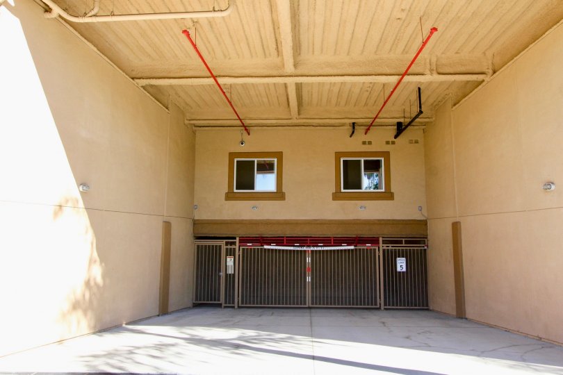 A view of the entrance to the underground garage with privacy gate under the Nevada Manor building.