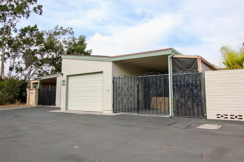 Black iron fence near a garage inside Oceana Mission at Oceanside CA