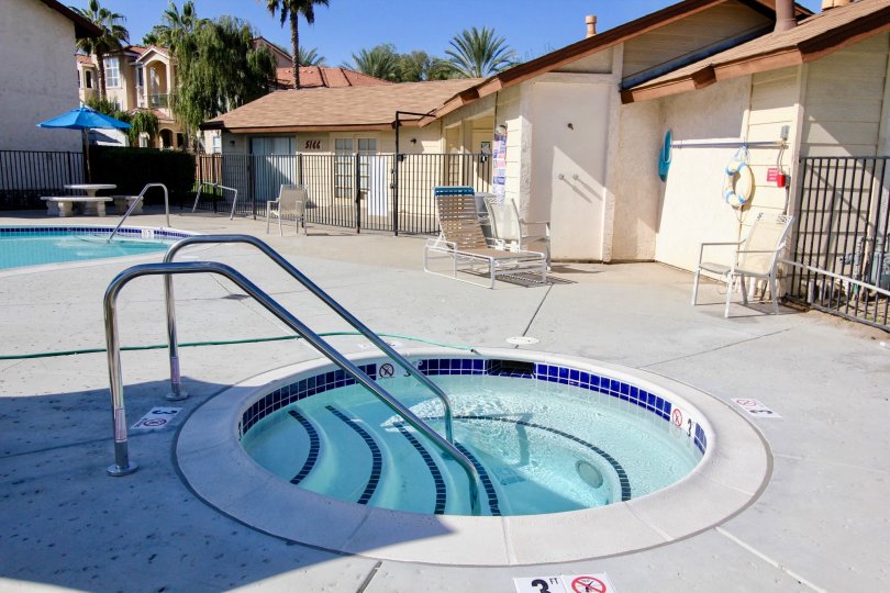 A sunny day at the small pool at Riverview Townhomes in Oceanside, CA.
