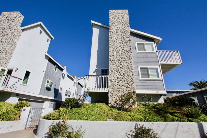 Three story town homes with very large chimney inside S Tait Street Condos inside Oceanside CA