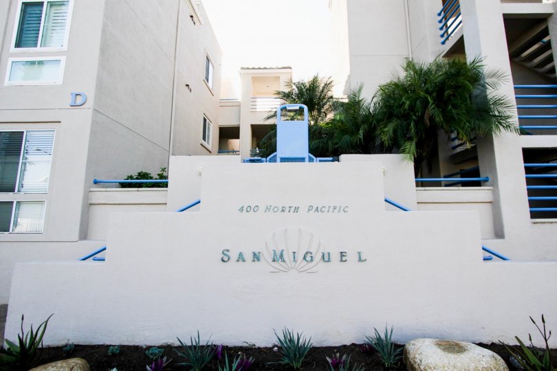 Entrance gate view of the building with board 400 NORTH PACIFIC in San Miguel IV