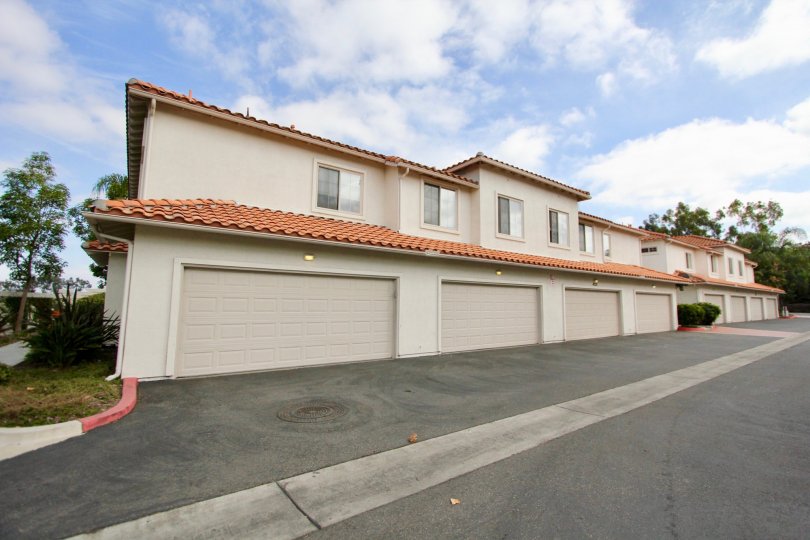 A row of town home garages in Oceanside, CA at Villas at Mission Point