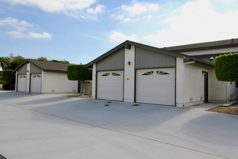 Twin garages sit beneath shining blue skies on this beautiful day