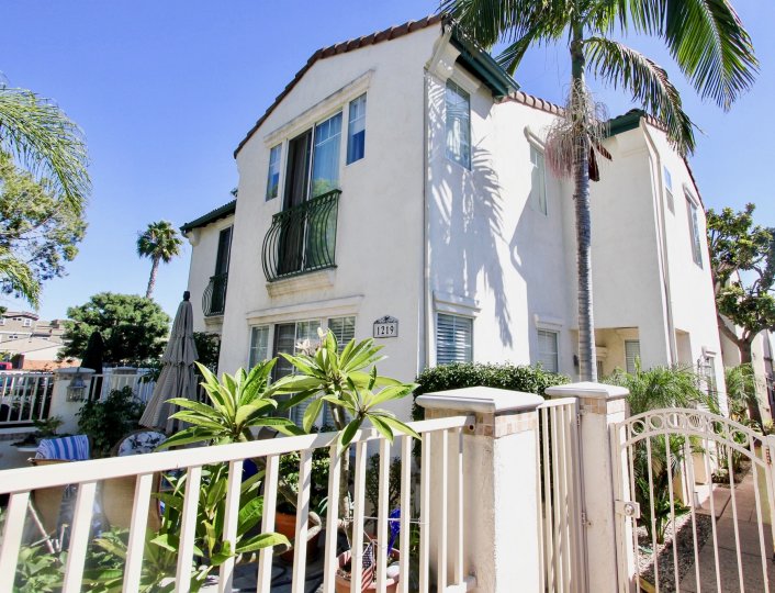 Sunny day side view of single home residence in 1219 Felspar, Pacific Beach, CA