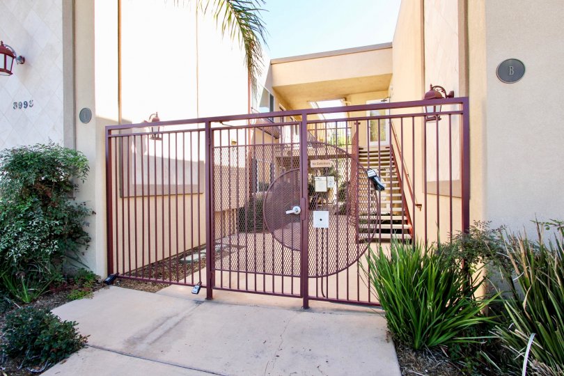 a security gate leading onto the housing area, locked and secure in Crown Point Jewell