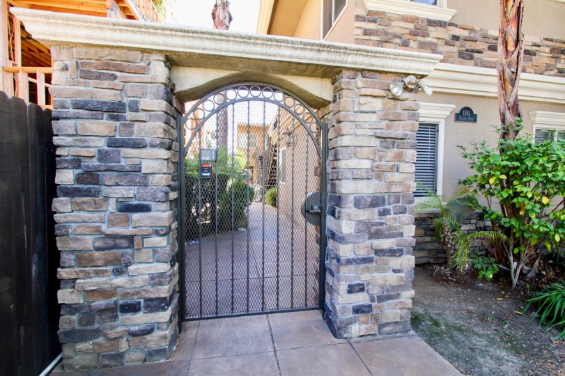 An entryway with stone cladding in the Felspar Park community.