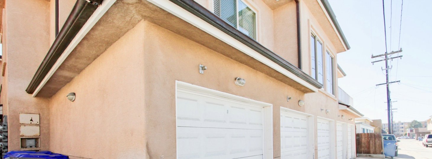 Nice garage doors and large windows are seen in Felspar Views of California