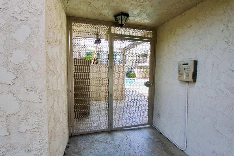 A stone waiting area for paging residents at La Casa Villa housing community
