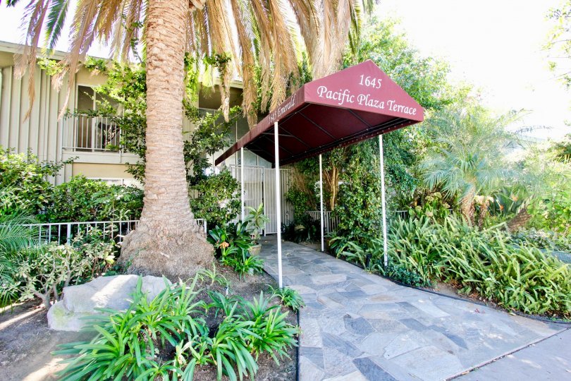 A covered entryway to the Pacific Plaza Terrace community.