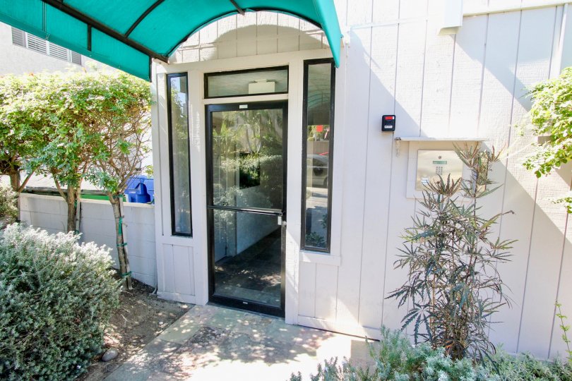 Covered entry doorway and keypad access at the Riviera Sands in Pacific Beach, California