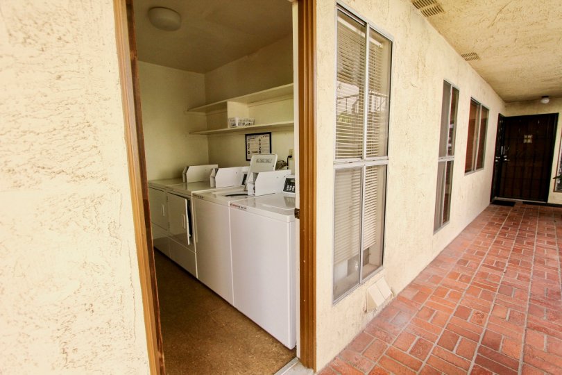 An exposed laundry room in the Shasta Daisy community.