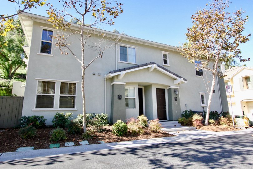 Two story home with gray pillars at Cypress Greens in Rancho Bernardo CA