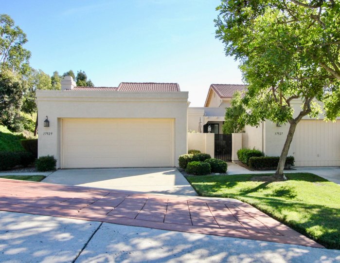 Three story residence near parking lot at Oaks North Villas in Rancho Bernardo CA