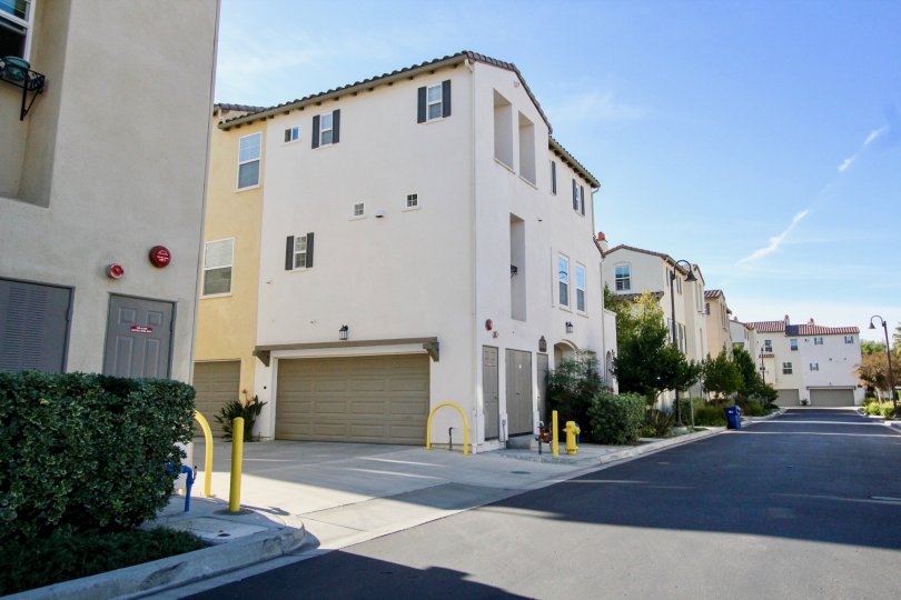 Three story residential buildings with garages at San Moritz in Rancho Bernardo CA