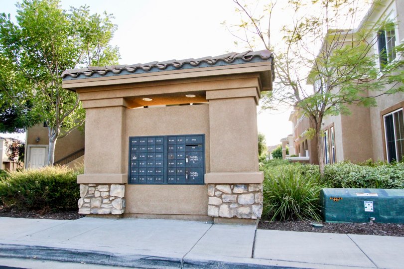 A clear sky day and an ornate mailbox area in the Savannah Terrace community within Rancho Bernardo, California.