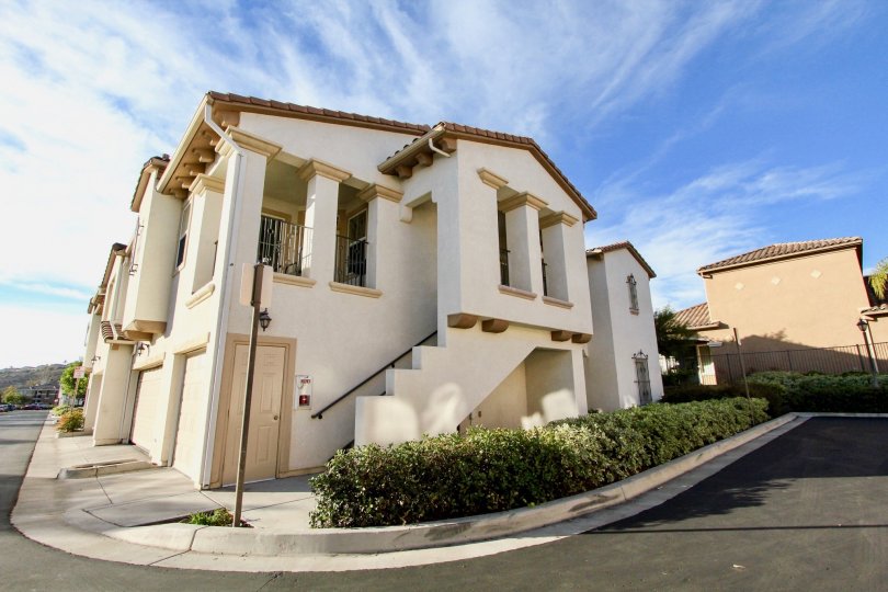 Two story housing with a street sign in Savannah Terrace at Rancho Bernardo in Rancho Bernardo CA