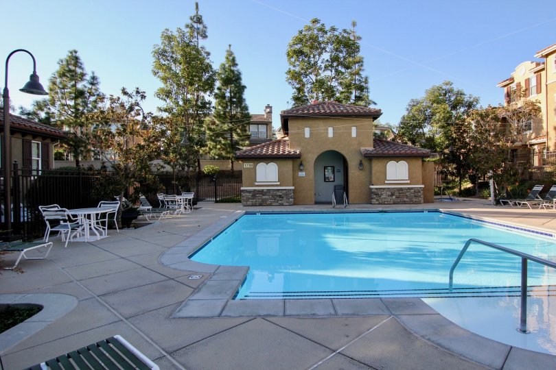 Swimming pool with chairs and tables of Morgans Corner.