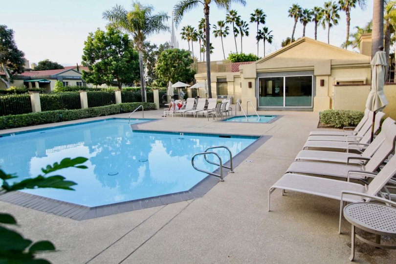 University City Apartments, University City, California, Outdoor Pool with Lawn Chairs