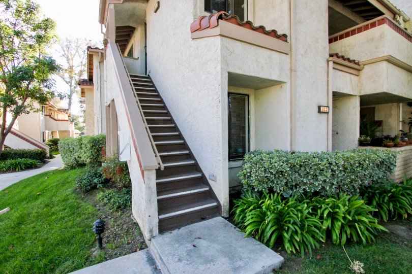 Two story housing with attached stairway at Shadowridge Glen in Vista California