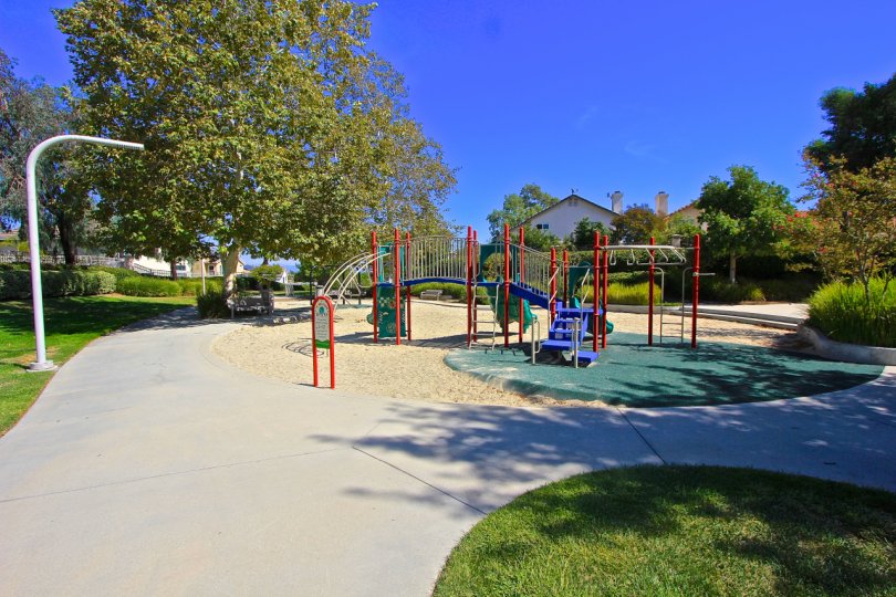 Enjoy the swingset and playground equipment at Paloma Del Sol